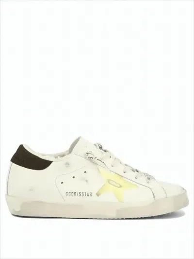 Golden Goose Distressed Leather Low-top Sneakers With Iconic Star Emblem In White