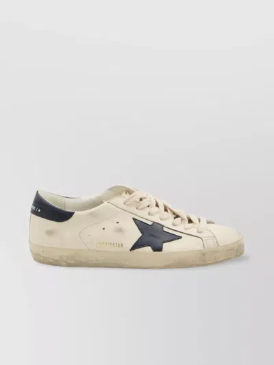 GOLDEN GOOSE DISTRESSED LEATHER SNEAKERS WITH SHINY BLUE ACCENTS