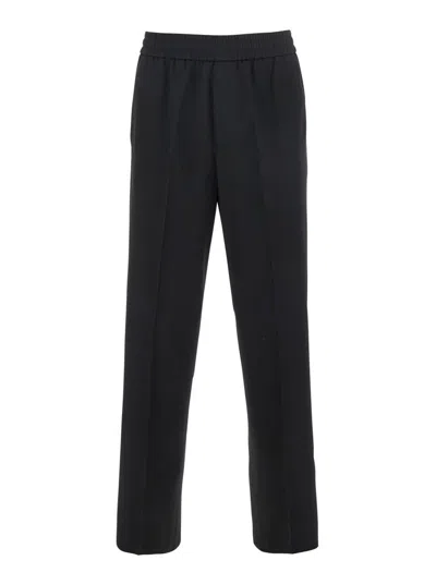 GOLDEN GOOSE 'LENNON' BLACK PANTS WITH ELASTIC WAIST AND LOGO ON THE BACK IN VIRGIN WOOL MAN