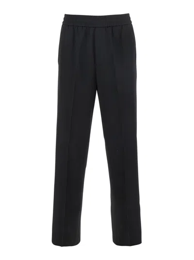 GOLDEN GOOSE GOLDEN GOOSE MEN 'LENNON' BLACK PANTS WITH ELASTIC WAIST AND LOGO ON THE BACK IN VIRGIN WOOL MAN