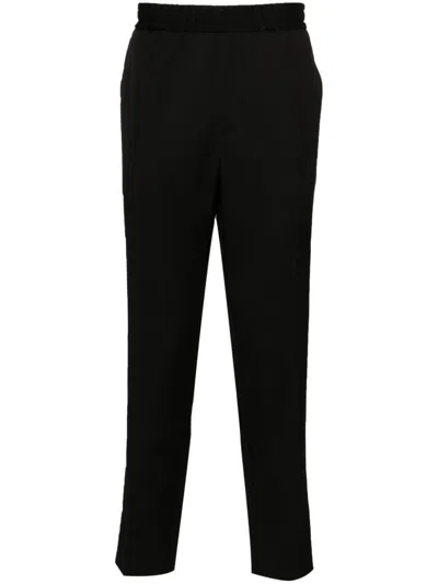Golden Goose Logo-plaque Virgin Wool Trousers In Black