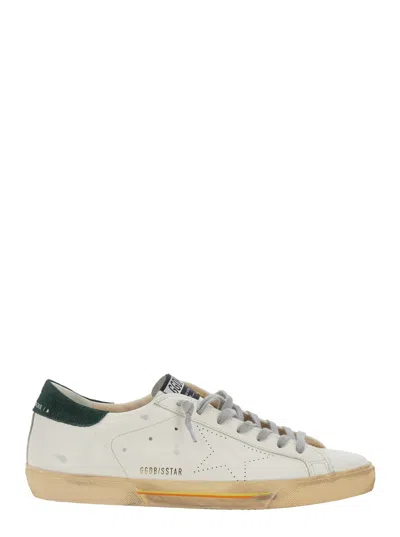 GOLDEN GOOSE GOLDEN GOOSE MEN 'SUPERSTAR' WHITE LOW TOP SNEAKERS WITH CONTRASTING HEEL AND LOGO PATCH ON THE TONG
