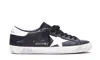 Golden Goose 'super-star' Black Low Top Sneakers With Logo Patch And Suede Details In Leather Man In Black