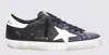 Golden Goose 'super-star' Black Low Top Sneakers With Logo Patch And Suede Details In Leather Man