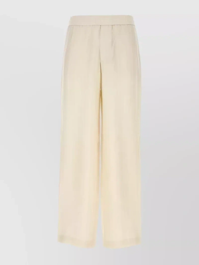 GOLDEN GOOSE VERTICAL STRIPE LOOSE-FIT TROUSERS WITH ELASTICATED WAISTBAND