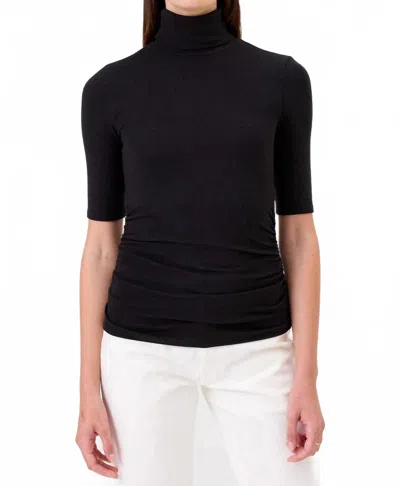 Goldie Half Sleeve Turtleneck Top With Ruching In Black