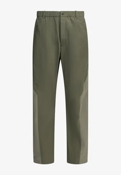 Goldwin Hyperdense Taffeta Track Pants In Brown