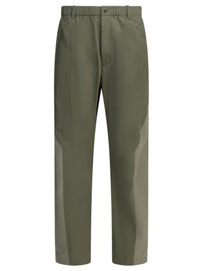 Goldwin Hyperdense Taffeta U/s Right Trousers Brown In Green