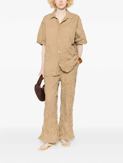 Gongdid Design Crinkled Flared Trousers In Neutral