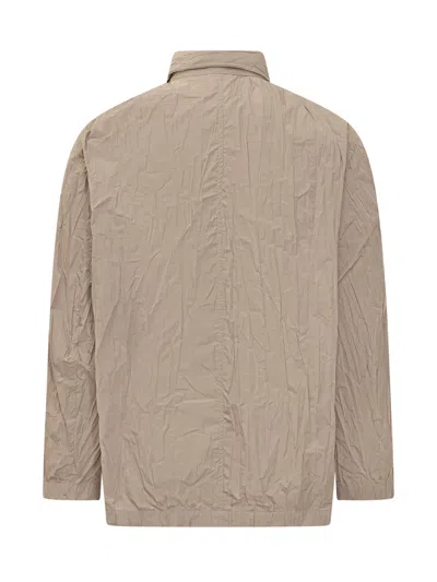 Gongdid Design Stylish Jacket With Neck And Pocket Details In Beige