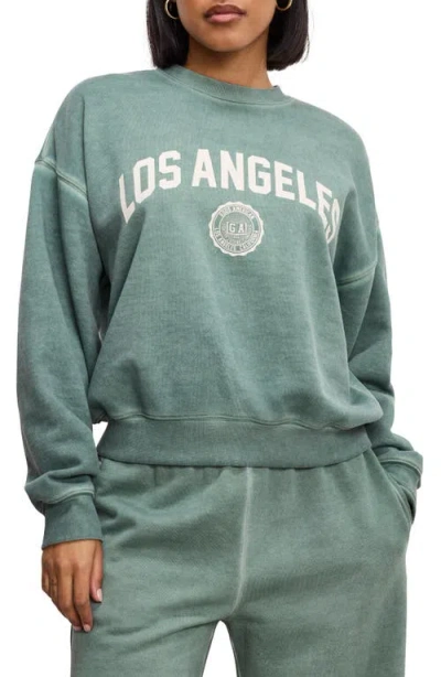 Good American Brushed Fleece Graphic Sweatshirt In Washed Fatigue Green