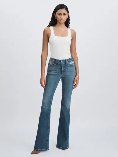 Good American Dark Indigo Flared Distressed Jeans In Purple