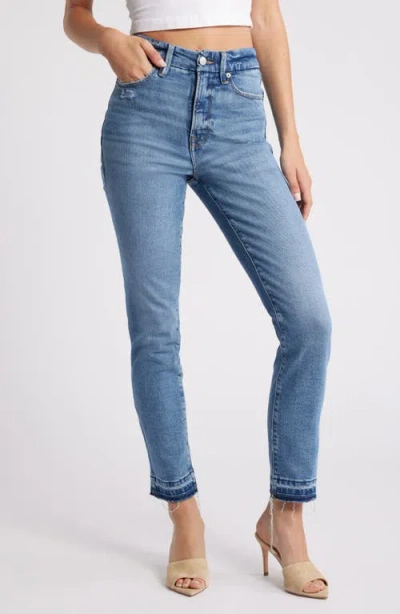 Good American Good Classic Distressed Release Hem Jeans In Indigo662