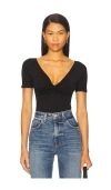 Good American Jersey Twist Front Bodysuit In Black