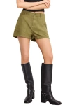 Good American Lite Cotton Blend Shorts In Green