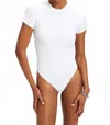 Good American Ribbed Fitted Bodysuit In White001 In White