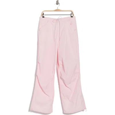 Good American Twill Parachute Pants In Pink