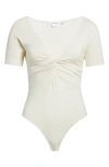 Good American Twist Front Jersey Bodysuit In Neutral