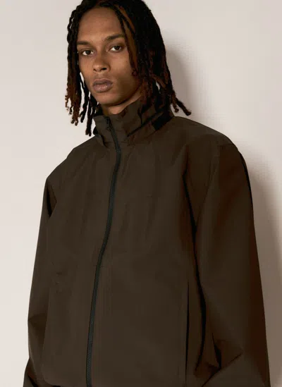 Gr10k Lightweight Hooded Jacket In Brown