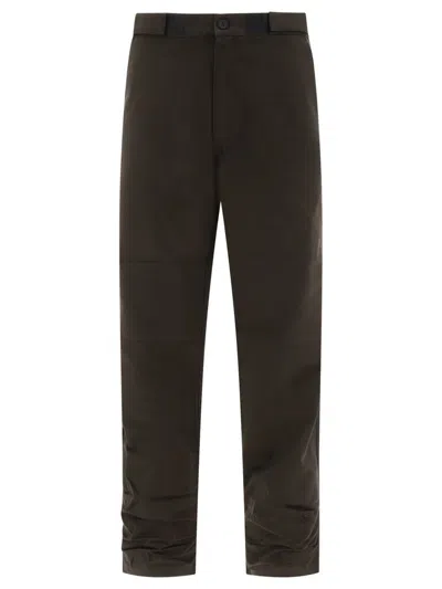 Gr10k "low Noise" Trousers In Brown