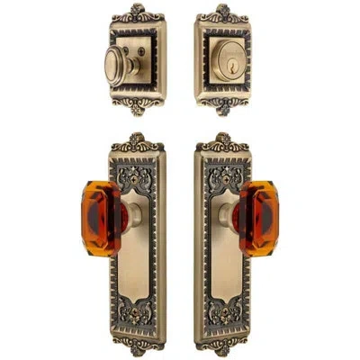 Grandeur Windsor Long Plate Entry Set With Baguette Amber Crystal Knob In Vintage Brass In Multi