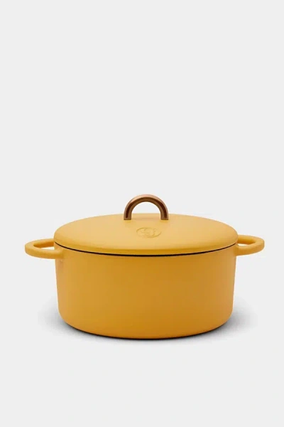 Great Jones Dutch Baby 3.5-qt Cast-iron Dutch Oven In Mustard At Urban Outfitters