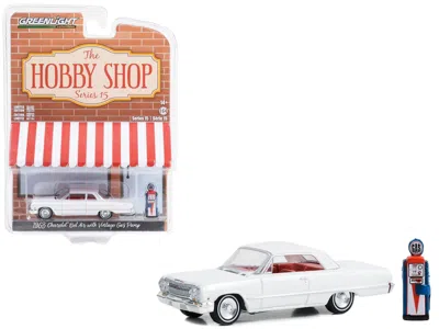 Greenlight 1963 Chevrolet Bel Air White With Orange Interior And Vintage Gas Pump "the Hobby Shop" Series 15 1/
