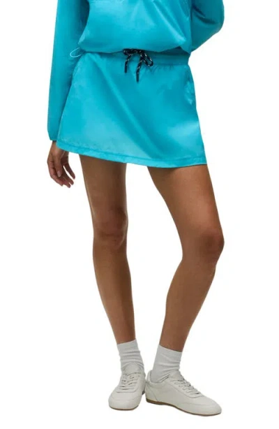 Greyson Wind Performance Skort In Blue