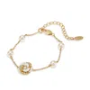 Grossé Women's Gold / White Crystal & Pearls Bracelet, Series Blanc Camelia