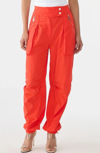 Gstq Nylon Parachute Pants In Deep Orange