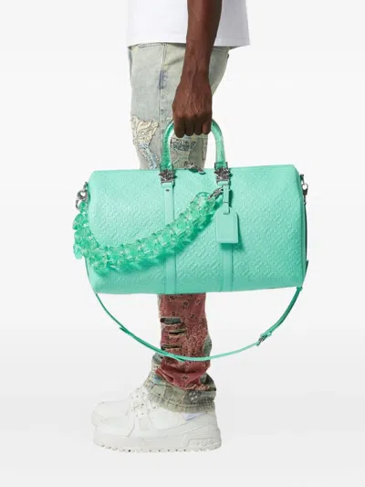 Guapi Embossed-monogram Leather Chain-strap Holdalll In Blue