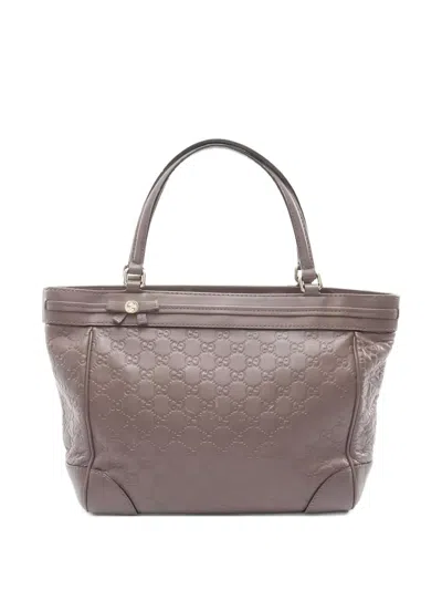 Pre-owned Gucci 00s Monogram-embossed Tote Bag In Brown
