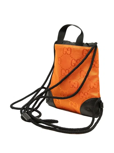 Pre-owned Gucci 2000-2015 Gg Nylon Off The Grid Drawstring Backpack In Orange