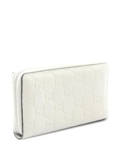 Pre-owned Gucci 2010s Logo-debossed Wallet In Gray