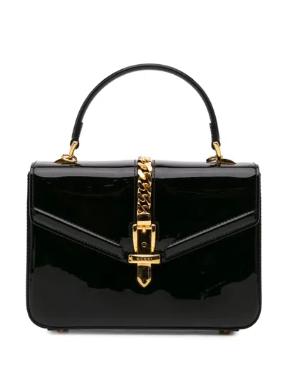 Pre-owned Gucci 2016-2024 Mini Patent Sylvie 1969 Top Handle Bag Satchel In Black