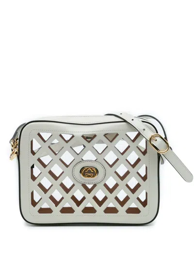 Pre-owned Gucci 2016-2025 Cutout Leather And Flora Canvas Infinity Crossbody Bag In Multi