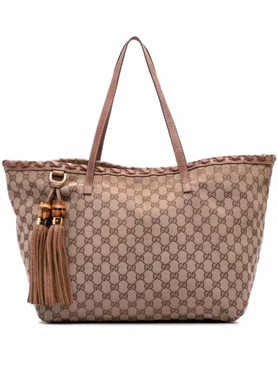 Pre-owned Gucci 2016-2025 Gg Canvas Bamboo Tassel Tote Bag In Brown