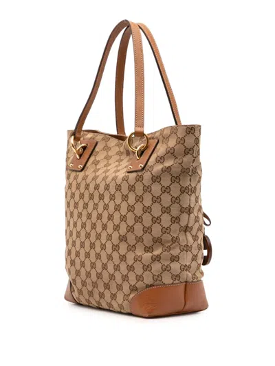 Pre-owned Gucci 2016-2025 Gg Canvas Gg Charm Tote Bag In Brown
