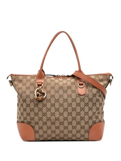 Pre-owned Gucci 2016-2025 Gg Canvas Heart Bit Satchel In Brown