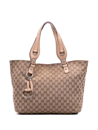 Pre-owned Gucci 2016-2025 Gg Canvas Icon Bit Tote Bag In Brown