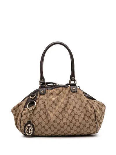 Pre-owned Gucci 2016-2025 Gg Canvas Sukey Satchel In Brown