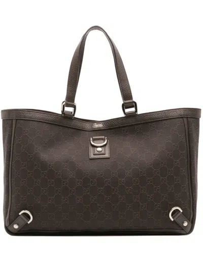 Pre-owned Gucci 2016-2025 Gg Denim Abbey D Ring Tote Bag In Brown