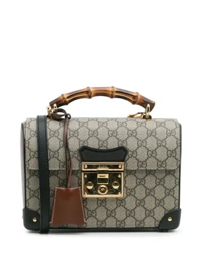 Pre-owned Gucci 2016-2025 Gg Supreme Bamboo Padlock Satchel In Brown