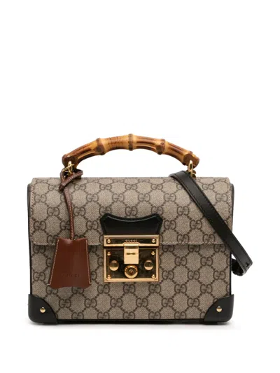 Pre-owned Gucci 2016-2025 Gg Supreme Bamboo Padlock Satchel In Brown