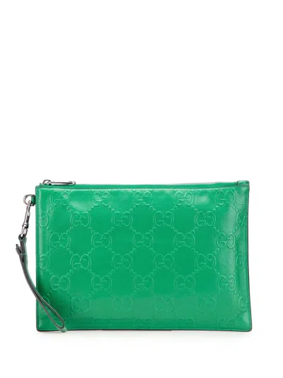 Pre-owned Gucci 2016-2025 Gg Tennis Embossed Leather Wristlet Clutch Bag