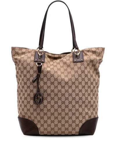Pre-owned Gucci 2016-2025 Large Gg Canvas Gg Charm Tote Bag In Brown