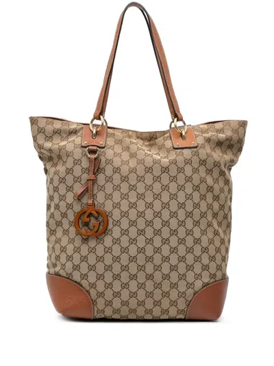 Pre-owned Gucci 2016-2025 Large Gg Canvas Gg Charm Tote Bag In Brown