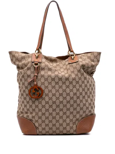 Pre-owned Gucci 2016-2025 Large Gg Canvas Gg Charm Tote Bag In Brown