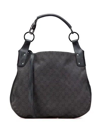 Pre-owned Gucci 2016-2025 Large Gg Denim Hobo Bag In Black