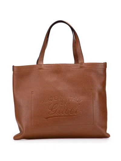 Pre-owned Gucci 2016-2025 Leather Embossed Logo Tote Bag In Brown